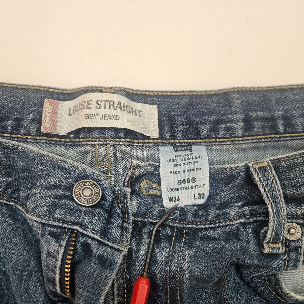 Levi's 569 Men's W34 L30 Loose Straight Fit Jeans Dark Blue Distressed Denim - Picture 8 of 9
